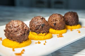 FALAFEL OF OLIVES AND DRIED TOMATOES
with carrot ‘hummus’
 at Passio Mediterrania in Mahon