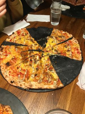 😋 at Pizzeria Trozo in Bilbao