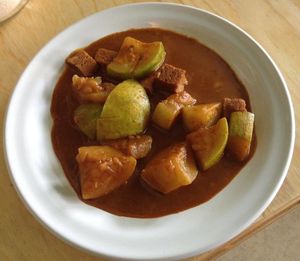 chilacayote en mole  at El Mana Vegetarian in Mexico City