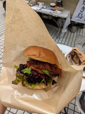 Deluxe Burger from the Yamanashi-based fully vegan food truck POS Kitchen Somewhere at Farmer's Market - UNU in Tokyo