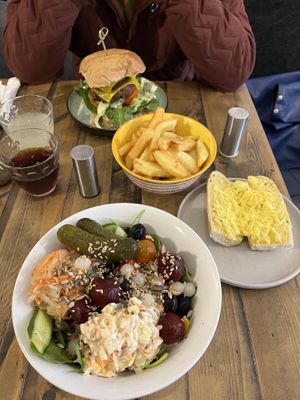 Double cheese burger, fries, green salad, cheesy garlic bread.   at No 18 Cafe in Swansea