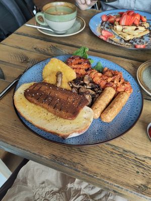 All what you crave from an english breakfast. Beans, bacon, sausages, mushrooms etc. at No 18 Cafe in Swansea