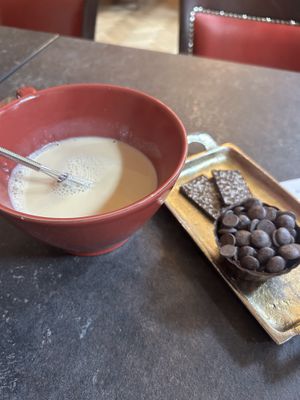 50-ish% (sweetest option) dark chocolate 8€ + oat milk 2€ (🙄)  at The Old Chocolate House in Bruges