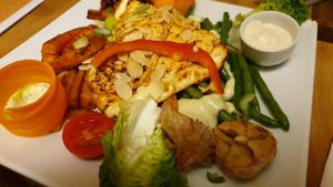 Marinated grilled cheese with homemade dip at Kafe Doma in Litomerice