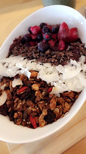 Açai Bowl with berries, cacao nibs, coconut and granola at Street Organics in Takapuna