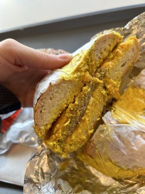 Vegan egg and vegan sausage on a whole-wheat everything bagel   at Bare Naked Bakery in Bellmore