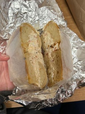 Onion bagel with vegan veggie cc  at Bare Naked Bakery in Bellmore