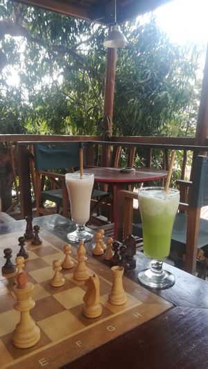 Banana juice and cucumber mint drink and a game of chess ;) at Catur'z Coffee Club in 