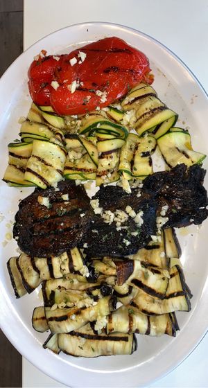 The most amazing roasted peppers, Zuchinni , eggplant ; and portabella mushroom with garlic. AMAZING. at Tiga's Artisan Pizzeria in Medford