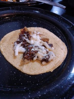 Taco de bistec con queso planet at Por Siempre Vegana Vol II in Mexico City