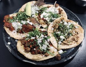 Milanesa, chicharrón prensado, big bebe, seitan al chimichurri, campechano at Por Siempre Vegana Vol II in Mexico City