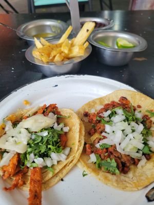 Tacos (tons of meats to choose from, and they come with your choice of toppings) at Por Siempre Vegana Vol II in Mexico City
