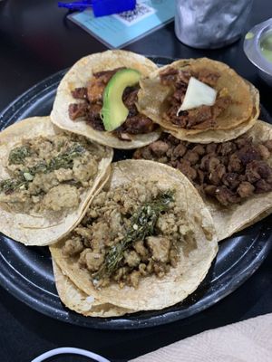 Tacos: Seitan chimichurri, al pastor, cecina, suadero. Comes with onion and parsley but I asked on the side.   at Por Siempre Vegana Vol II in Mexico City