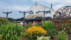 view of restaurant from street at S&P Oyster Company in Mystic