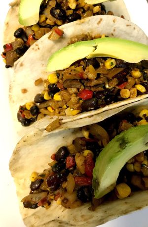  A perfect combination of eggplant, zucchini, squash, red peppers, Spanish onion,  black beans, corn, avacado and a jalapeño cumin crema.  at S&P Oyster Company in Mystic