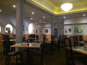 Inside tables and booths at The King and I in Rochester