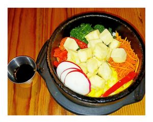 Vegan HotStone Bibimbap +Fried Tofu, Citrus Garlic Soy Sauce at Denden Cafe in Providence