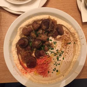 Hummus with onions and mushrooms  at Hummus Bar - Hollan Erno in Budapest