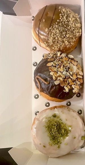 coffee & walnut, peanut butter, and vanilla pistachio donut  at The Rolling Donut - Dublin 2 in Dublin
