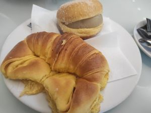 Croissant and bola de Berlim at Confeitaria Henrique Carvalho in Matosinhos