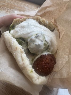 Falafel pita with s’rug and garlic sauce  at Taïm - West Village in New York City