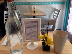 Water and specials on table at Quintessence in New York City