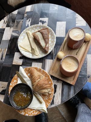 Pear cake, Croissant, Cappuccino with oat milk at Vero Caffe in Bruges