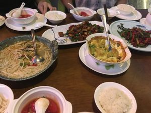 Tofu noodles. Cheesy potatoes, tomato and barley. at Yihua Yiye in Chongqing