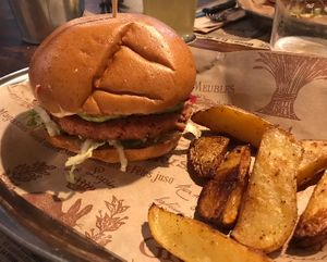SOUL CLAP burger: artisanal bun, veg burger, guacamole, pickled onion, salad and jalapeño mayo   at Urban Farmhouse in Pordenone