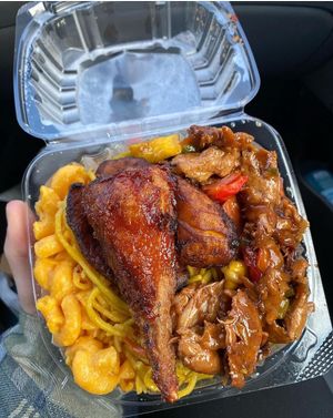 Small meal with Mac n cheese, lo mein, ginger chicken, and a drumstick  at Veggie Castle in Jamaica