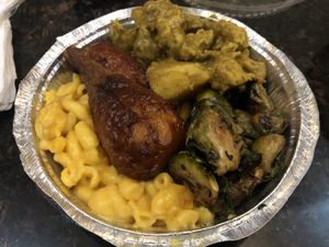 Medium dish. Mmm, chicken drumsticks. at Veggie Castle in Jamaica