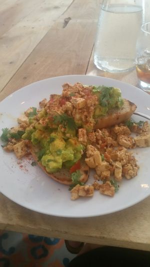 mashed avocado with tofu on toast at Cafe Stepping Stone in Cartagena