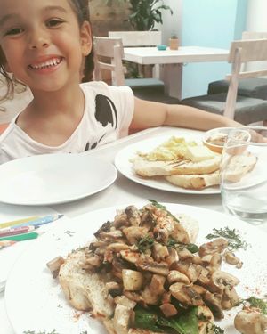 Happy breakfast!Sautéed mushrooms with spinach and homemade bread at Cafe Stepping Stone in Cartagena