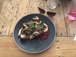 Garlic mushrooms with spinach on toast with beetroot hummus at Cafe Stepping Stone in Cartagena