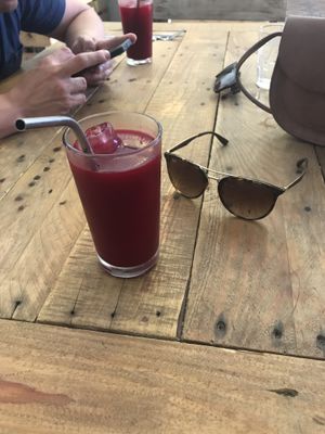 Juice of the day beetroot orange &apple. Metal straw! at Cafe Stepping Stone in Cartagena