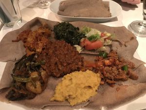 4 vegan dishes on injerabread (fyi, the red one is spicy)  at EthioStar in Stockholm