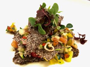 Fresh salads, with chea seeds bread at Posta Zirm Hotel in Corvara In Badia