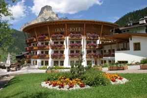 The Hotel with mountain Sassongher in the background at Posta Zirm Hotel in Corvara In Badia