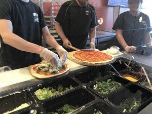 Made to order! Lots of yummy topping options at Pie O Mine Greens in Orchard Park