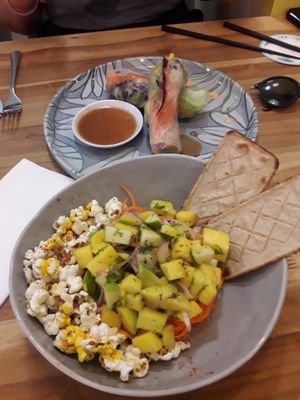 Mango ceviche with carrots red onios cilantro and apple. 
Rice roll with veggies at Pezetarian in Cartagena