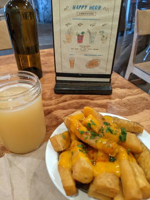 Happy Hour beer and Chickpea Fries at Chickpea Restaurant in Vancouver