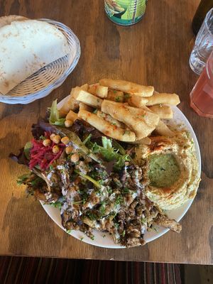shawarma served platter stylee  at Chickpea Restaurant in Vancouver