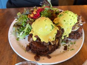Latkes Benechick with Tofu Egg and side salad at Chickpea Restaurant in Vancouver
