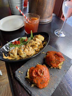 Tempura vegan sushi and stuffed zucchini sachets  at La Bartola in Sevilla