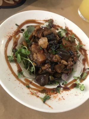 Cooked salad with eggplant, tomato, olives at La Bartola in Sevilla