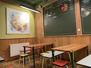 Weird classroom decor at Velicious Burger in Strasbourg