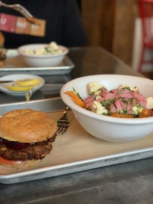 House-made vegan burger and the vegan poutine. at Chic Shack in Quebec