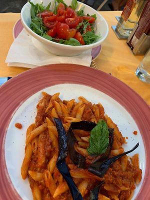 Penne with soya ragu and rocket salad with no dressing  at Fauno Bar in Sorrento