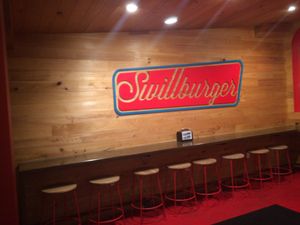 Sign at The Playhouse & Swillburger in Rochester