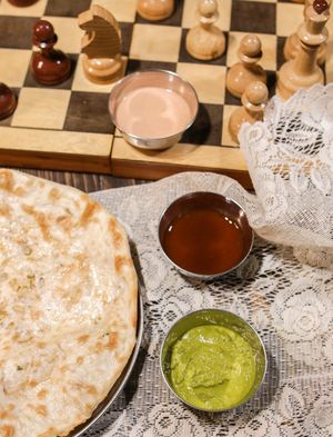 chickpea naan with green tamarind and garlic chutney at Om Namo in Minsk